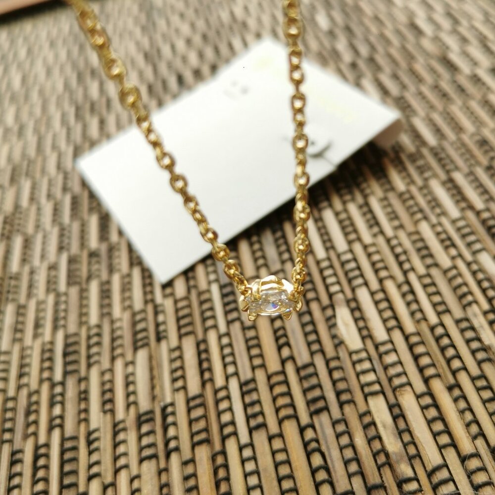 Kendra Scott Cailin White Crystal Pendant Necklace in Gold